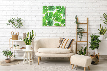Interior of modern living room with white sofa and different houseplants