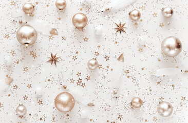 Christmas background with Xmas golden decor pattern top view on white backdrop .Beautiful Xmas greeting card. Poster.New Year decoration.