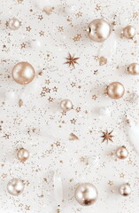 Christmas background with Xmas golden decor pattern top view on white backdrop .Beautiful Xmas greeting card. Poster.New Year decoration.