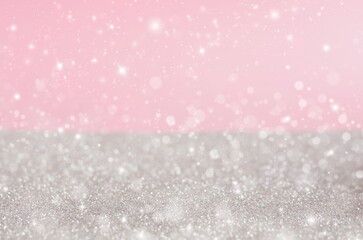 Abstract pink silver sparkle background template with copy space.Christmas blur glitter bokeh festive backdrop.