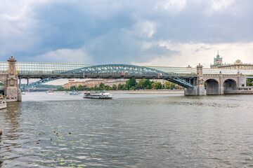 View of the Moscow river embakment, Pushkinsky bridge and cruise ships at sunset.