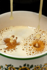 Espresso coffee with coffee beans on old background.