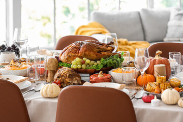 Festive table setting with tasty food for Thanksgiving Day in room, closeup