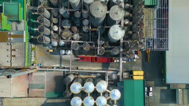 Aerial view of palm kernel oil tanks in oil refinery plant , Malaysia