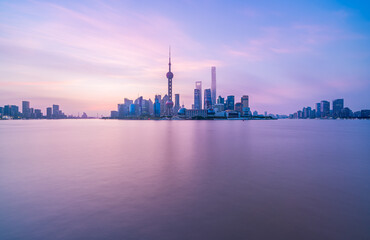 Naklejka premium financial district in Shanghai at dawn , China