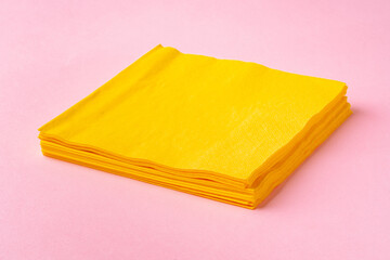 Paper napkins on pink background close up