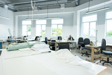 Interior of a sewing warehouse of furniture factory with equipment and materials