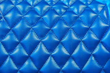 Quilted fabric background for rurniture upholstery close up