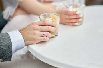 bride and groom cutting wedding cake