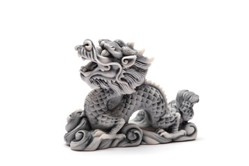 Gray dragon statue isolated on a white background. The symbol of 2024. Happy Chinese New Year.