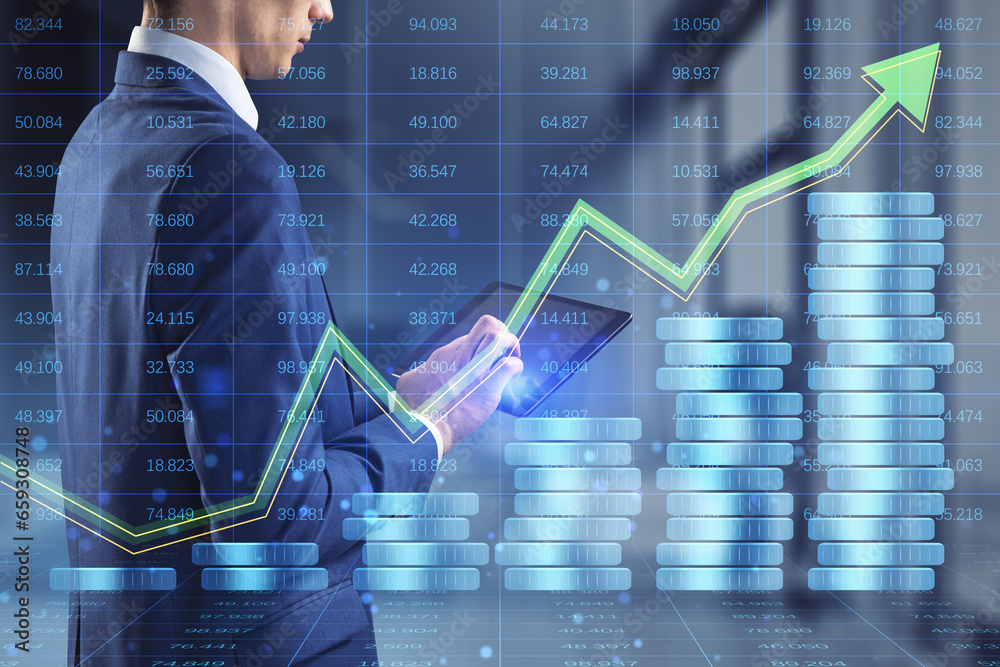 Poster close up of businessman hand using tablet with creative forex chart hologram with stacked coins on b