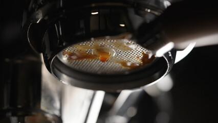 closeup shot of espresso extraction with bottomless portafilter