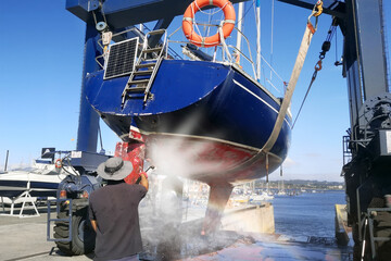 motorboat yacht  in shipyard  for repair and maintenance in marina port