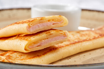 pancakes with ham on plate