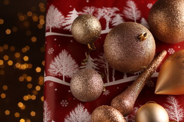 photo a table adorned with Christmas lights and gold garlands sets the stage for a joyful New Year celebration. 