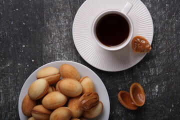 photo a delightful snack, topped with creamy condensed milk, it's an appetising calorie-rich treat that promises to satisfy any sweet tooth with its rich.