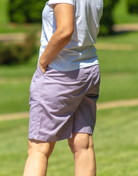 Shorts on a man in the park. Close-up