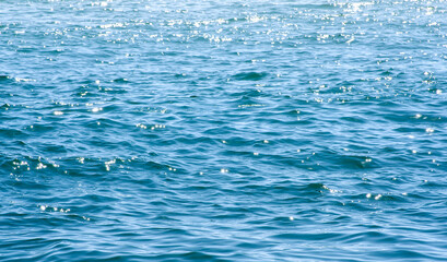 Blue sea water background texture - 659339510