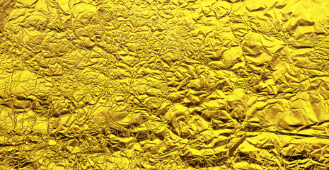 Golden foil crumpled background texture
