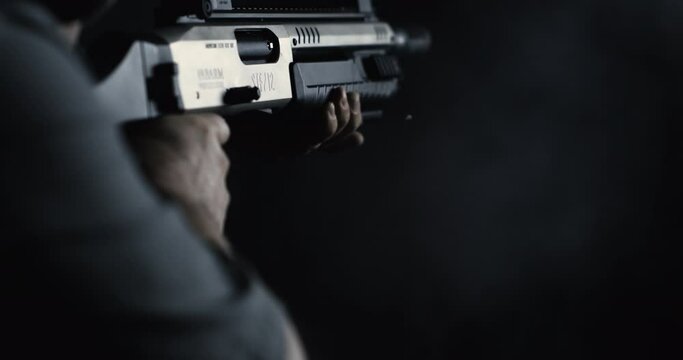 800fps Slow-Motion of Smoke-Filled Shotgun Firing, Man Releasing a Potent, High-Speed Blast with Visible Impact