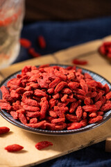Dried Chinese wolfberries or Goji berry or Matrimony vine on table.