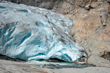 Blue glacier ice, close-up of permafrost layers, glacier in Norway