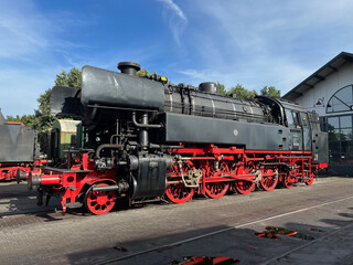 Fototapeta na wymiar steam locomotive at an old train-station