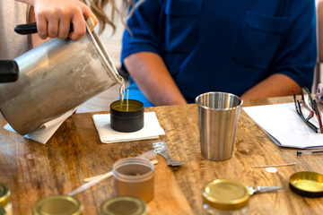 Soy candle workshop. Liquid soy wax. Candle making.