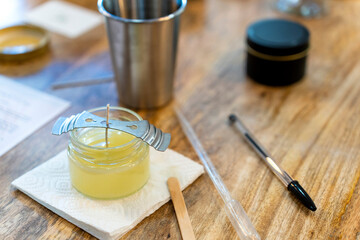 Soy candle workshop. Liquid soy wax. Candle making.