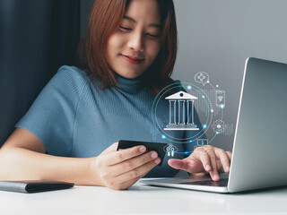 Cashless Society, digital wallet, e-payment and fintech concept. Asian woman using credit card at...