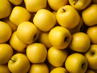 Fresh yellow apples upper view background 