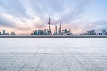 financial district buildings of shanghai and empty floor at dawn