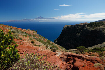 Fototapeta na wymiar La Gomera, Spain. View of Teide volcano from the plateau above the Gomeran village of Agulo. 