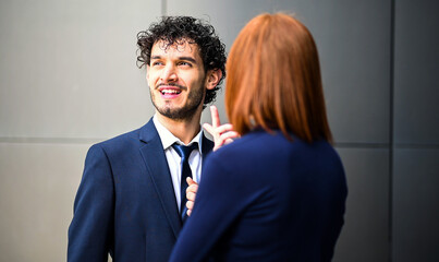 Business partners discussing together outdoor in a modern urban setting