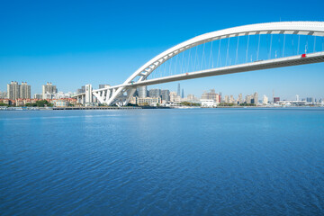 Naklejka premium bridge and river in Shanghai, China