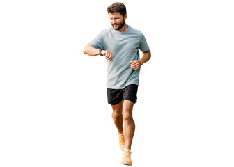 Fototapeta premium A hardy young man running alone. Routine training development of the cardiac system. Slim body and active lifestyle. A happy runner uses a fitness watch on his arm.