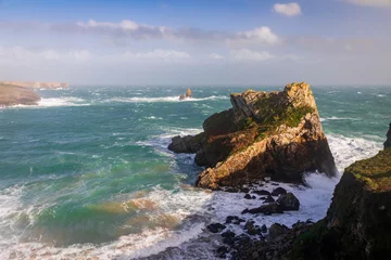 Fotobehang Church Rock on the coast of Broad Haven south Pembrokeshire Wales with storm Agnes © SuxxesPhoto