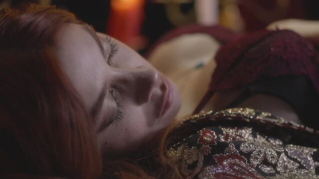 Vampire Elegance: Sleeping Girl in a Red Gown