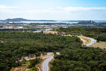 Aerial view of Red Rover Road with Gladstone harbour in the background, Queensland, Australia.