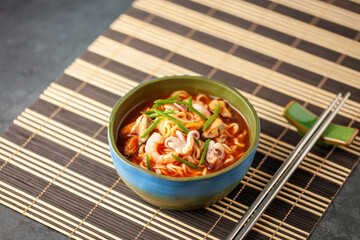 Jjamppong. Korean Seafood Noodle Soup in Bowl. Asian cuisine.