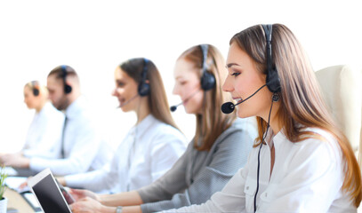 Portrait of call center worker accompanied by his team. Smiling customer support operator at work on a transparent background - obrazy, fototapety, plakaty
