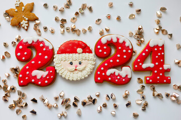 Christmas and New Year banner gingerbread cookies numbers 2024 on white background with copy space