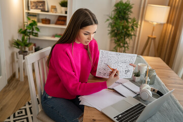 one woman student use computer for online class with mentor professor