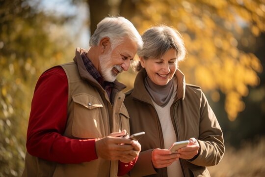 old people couple natural walking on traking outdoor activity using smartphone checking route map location for make a walking plan to their destination goal casual relax old adult walking outdoor - Powered by Adobe