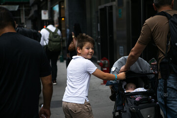 New York,  New York state  USA - August, 30, 2023 - Beautiful day view on Broadway of Manhattan in New York with people walking