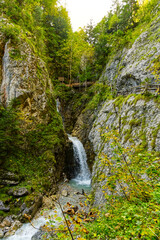 Wolfsklamm gorge in Austria a rock in autumn waterfall