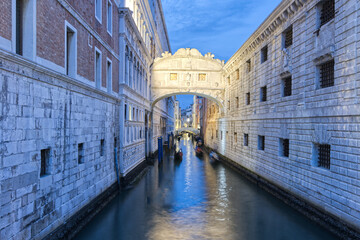 Famous bridge in „Ponte dei Sospiri“ Venice in Italy the Grand canal street and water artistic pastel colors in evening - 659408114