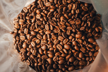 Roasted coffee beans in a plastic bag