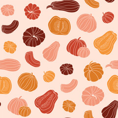 Pumpkin stylish seamless pattern. Autumn colorful food fabric design in hand-drawn style. Whole and slices of pumpkin isolated on pastel orange background. 