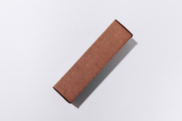 Brown cardboard rectangular box top view on white background mockup